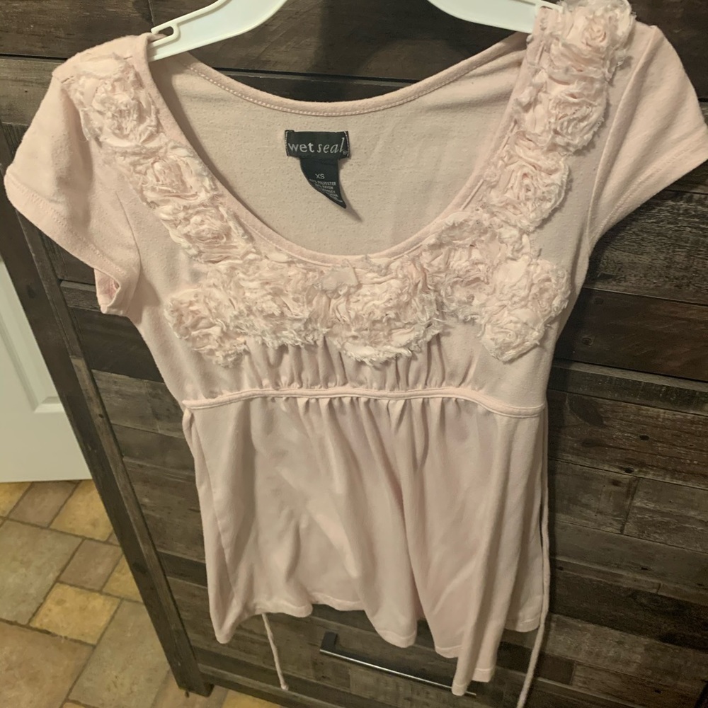 Wet seal floral shirt in fair condition